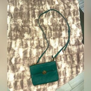 Tory Burch Kelly Green Crossbody Bag with gold TB emblem.